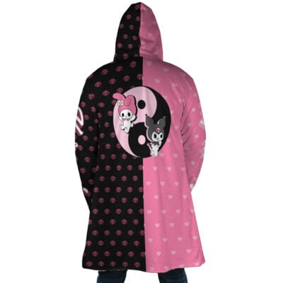 Someone wears the My Melody and Kuromi Sanrio Dream Cloak Coat—a split black and pink hooded coat with a yin-yang featuring My Melody and Kuromi, pink skulls on the black side, hearts on the pink side, and their face hidden by the hood.