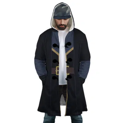 A man stands with hands in his pockets, looking down, wearing a Rimuru Tempest That Time I Got Reincarnated as a Slime Dream Cloak Coat over a white shirt and cap.