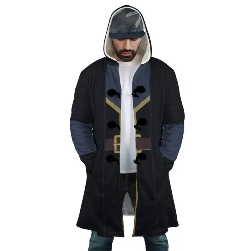 A man stands with hands in his pockets, looking down, wearing a Rimuru Tempest That Time I Got Reincarnated as a Slime Dream Cloak Coat over a white shirt and cap.