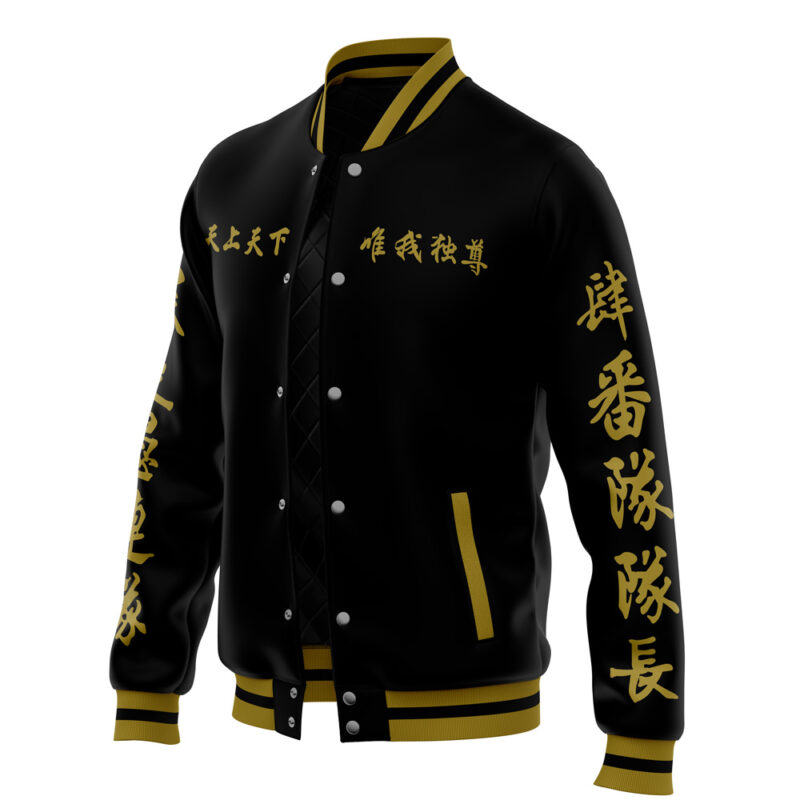 The Manji Gang Tokyo Revengers Varsity Jacket is a black varsity jacket with gold trim and gold Chinese characters on the chest, sleeves, and shoulders. It features snap buttons and side pockets, displayed on a white background.