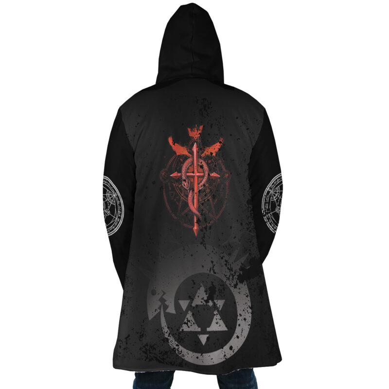 Someone wears the Transmutation Circle Fullmetal Alchemist Dream Cloak Coat—a long black hooded coat with faded, grunge-style red and white alchemy symbols on the back and sleeves, including a large red winged serpent on the back.