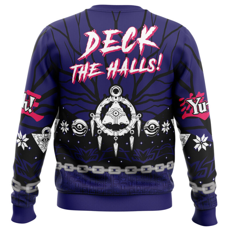 The Its Time To Yule Yugioh Ugly Christmas Sweater showcases bold pink and white Deck the Halls! text, Yu-Gi-Oh! symbols, chains, and the Millennium Puzzle on a dark blue background for a festive holiday look.