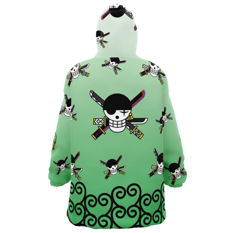 The Zoro Pattern One Piece Snug Oversized Blanket Hoodie features a green gradient, repeating cartoon skulls with bandanas and three swords, plus black swirling borders along the bottom hem.