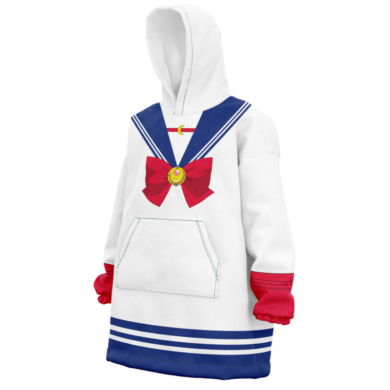 The Usagi Tsukino Sailor Moon Snug Oversized Blanket Hoodie features a white design with blue sailor stripes, a large red bow with gold brooch on the chest, red cuffs, blue hem, front pocket, and hood—anime schoolgirl inspired.
