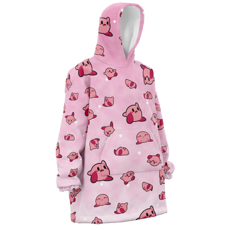 The Kirby Pattern Nintendo Snug Oversized Blanket Hoodie features a hood and cute illustrations of Kirby in various poses on a light pink background.