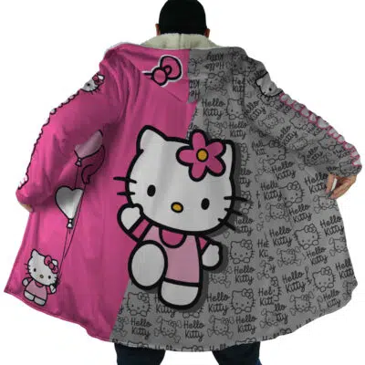 A person faces away from the camera wearing the Hello Kitty Sanrio Dream Cloak Coat, a long, colorful coat with large Hello Kitty graphics and pink, gray, and white patterns, showing the character holding balloons and waving.