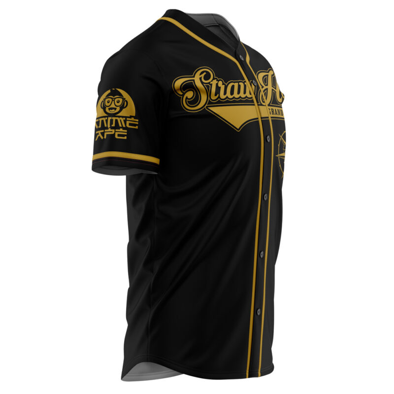 The Straw Hat Grand Fleet One Piece Baseball Jersey features black fabric with gold trim and buttons, “Straw Hat” in bold gold script on the chest, plus a smiling cartoon face and Japanese text on the left sleeve.