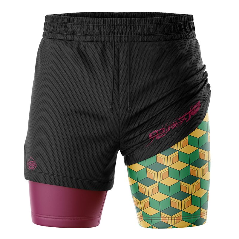 The Giyu Tomioka Demon Slayer Performance Shorts feature an asymmetric design: the left leg is black with maroon underneath, while the right shows a green, yellow, and beige geometric pattern with pink Japanese text.