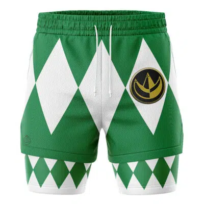 The Green Ranger V1 Mighty Morphin Power Rangers 2-in-1 Performance Shorts feature a white diamond pattern, drawstring waistband, and gold circular emblem on the left thigh, with additional green and white diamonds on the lower legs.