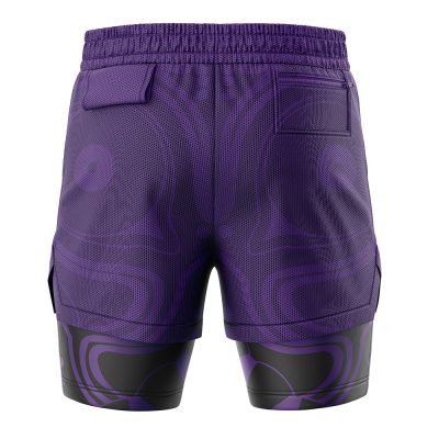 The Majoras Mask Legend of Zelda 2-in-1 Performance Shorts feature a deep purple base with abstract patterns, black side panels, layered black and purple compression shorts, two back pockets (one with a flap), and an elastic waistband.