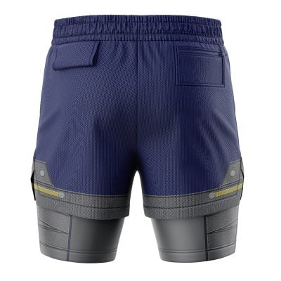 The Shield Style Legend of Zelda 2-in-1 Performance Shorts are shown from the back, featuring a navy textured upper section, two back pockets, and a gray metallic-patterned lower with yellow side accents.