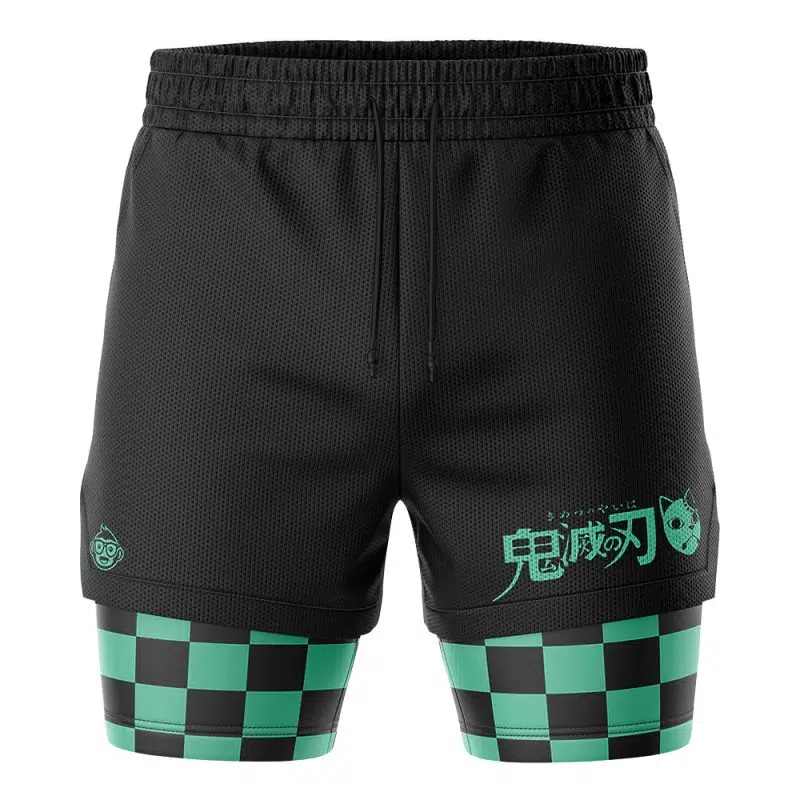 Tanjiro Kamado Demon Slayer Performance Shorts: Black athletic shorts with a drawstring waist, green Japanese text and mask graphic on the right leg, plus a black and green checkerboard underlayer on both legs.