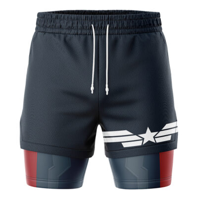 The Captain America Marvel Comics 2-in-1 Performance Shorts feature navy blue athletic shorts with a white star and wing design over fitted shorts with a red, blue, and gray pattern, plus white drawstrings at the waistband.