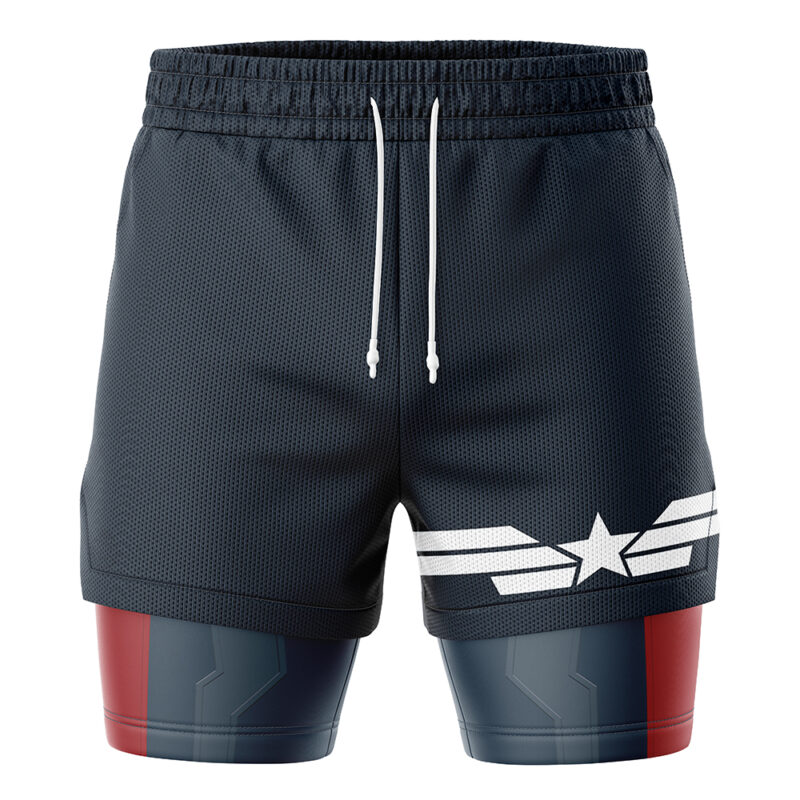 The Captain America Marvel Comics 2-in-1 Performance Shorts feature navy blue athletic shorts with a white star and wing design over fitted shorts with a red, blue, and gray pattern, plus white drawstrings at the waistband.