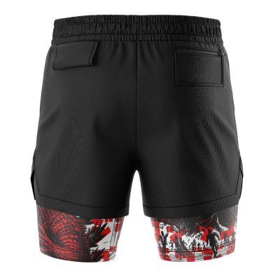 Back view of Godzilla 2-in-1 Performance Shorts in black, featuring pockets and a layered design. The lower layer displays a red and black Godzilla graphic with city buildings and running silhouettes in the foreground.