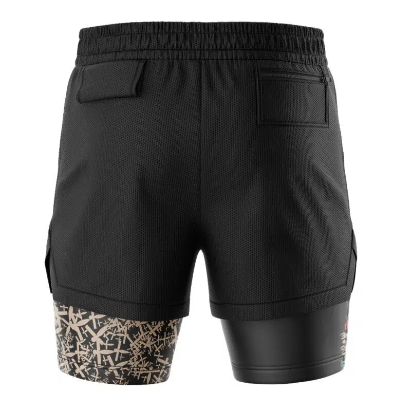 Back view of Haku Spirited Away 2-in-1 Performance Shorts: black with an elastic waistband, two rear pockets, and built-in compression shorts. Beige abstract pattern appears on the right leg’s compression layer.