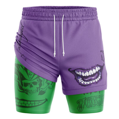 The Joker DC Comics 2-in-1 Performance Shorts feature purple fabric with a drawstring, a bold comic-style grinning mouth on the right, and green sections with skull and Joker-themed graphics on the left leg.