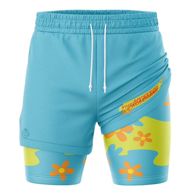 The Mystery Machine Scooby-Doo 2-in-1 Performance Shorts feature light blue fabric with a right-side overlay that reveals a yellow and blue floral pattern beneath, playful white drawstrings at the waistband, and a colorful, fun design.