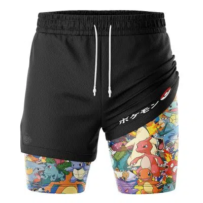 The Pocket Monsters Pokemon 2-in-1 Performance Shorts feature black athletic fabric with a white drawstring; the left leg is plain black, and the right showcases colorful Pokémon characters, Japanese text, and a Poké Ball graphic.