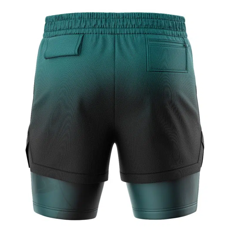 Back view of the Snorlax Pokemon 2-in-1 Performance Shorts for men in dark teal and black, featuring an elastic waistband, mesh texture, two rear pockets, and built-in compression shorts.