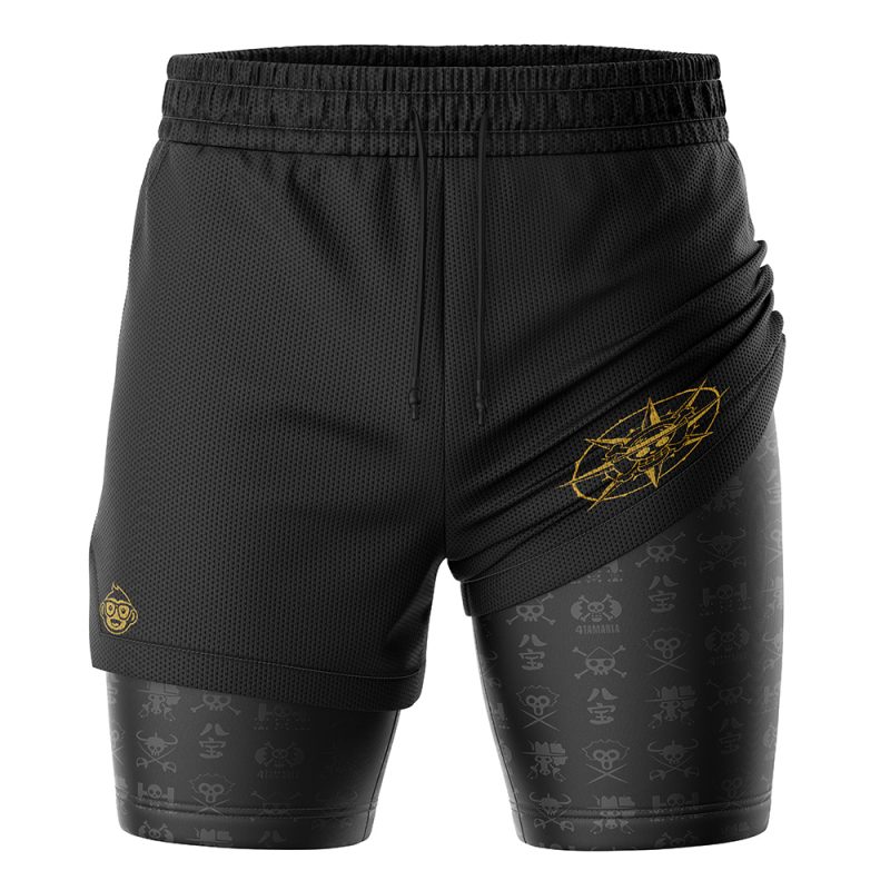 The Straw Hat Grand Fleet One Piece 2-in-1 Performance Shorts feature a black design with an elastic waistband, gold geometric detail on the left thigh, and a layered look with gray patterns and symbols on the lower layer.