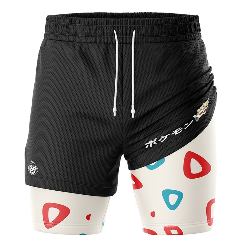 The Togepi Pokemon 2-in-1 Performance Shorts feature black athletic shorts with a white drawstring layered over white compression shorts decorated with red and teal geometric shapes, plus Japanese text and a colorful emblem on the right.