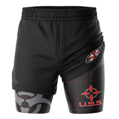 The Umbrella Corp Resident Evil 2-in-1 Performance Shorts feature black athletic shorts with an elastic waistband over black compression shorts decorated with a red grid, biohazard symbol, red star emblem, and bold U.S.S. text.