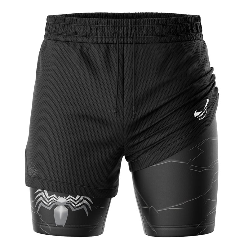 The Venom Marvel Comics 2-in-1 Performance Shorts feature black athletic styling with an outer mesh layer, inner compression layer, a white spider emblem, subtle cracked patterns, and a small white logo on the right side.