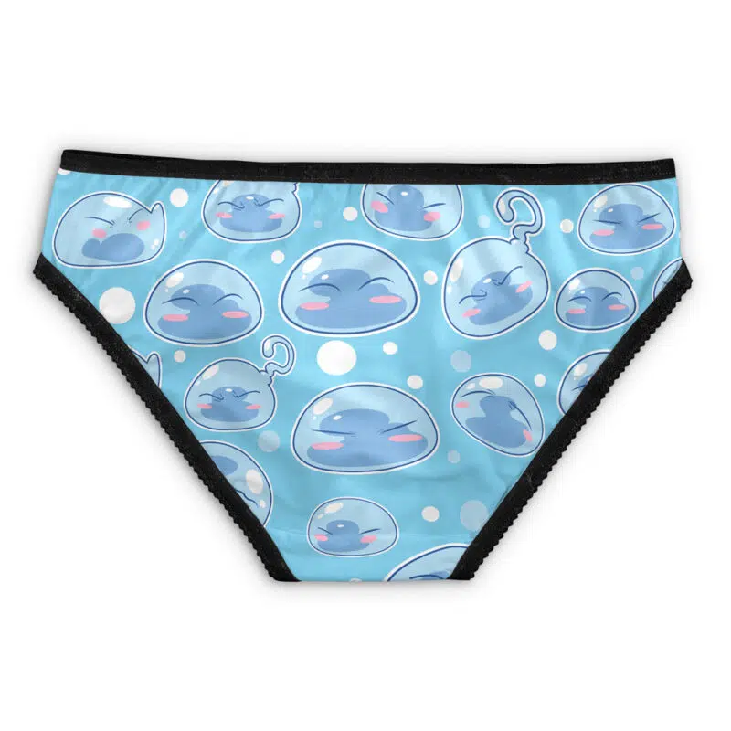 Anya Forger Spy X Family Panties featuring blue fabric with black trim, decorated with cute, cartoonish blue slime characters in bubbles on a light blue background.