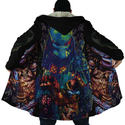 A person wearing the Crusader Templar Cross Dream Cloak Coat, featuring a vibrant, detailed illustration of a sci-fi armored alien with a weapon and intense patterns on the back. The wearer’s face is hidden.