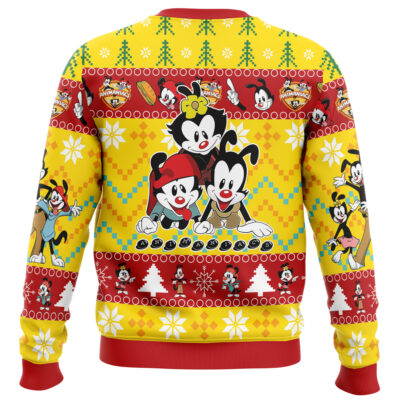 A festive holiday sweater featuring the Christmas Mobile Suit Vintage Japanese Gundam design, with colorful patterns, trees, snowflakes, and classic Gundam imagery on a vibrant yellow and red background.