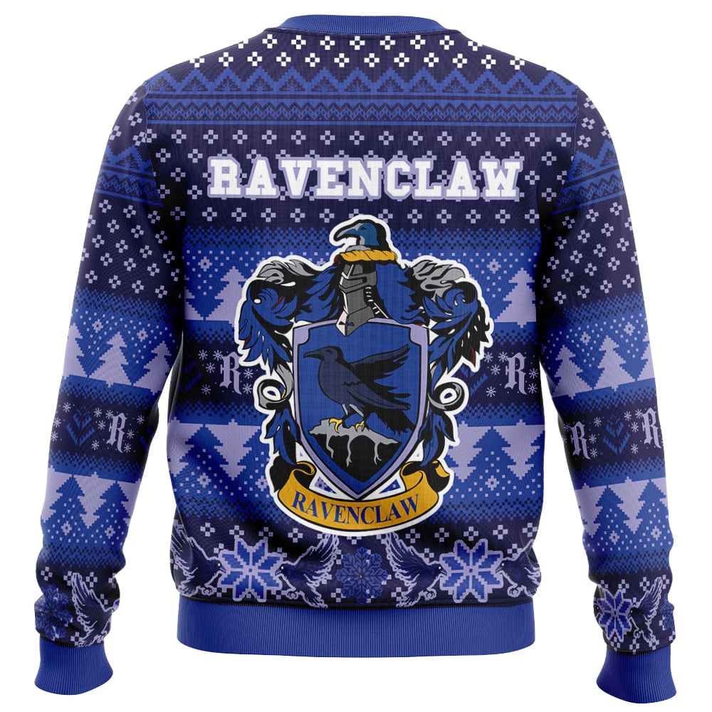 A yellow and black sweater features the Hufflepuff crest from Harry Potter, with a badger and HUFFLEPUFF text above it, surrounded by snowflake, tree, and star patterns.