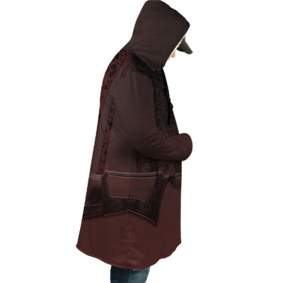 A person stands in profile against a white background, wearing the Midna Twilight Princess The Legend of Zelda Dream Cloak Coat with hands in pockets, blue jeans, and a cap under the hood.
