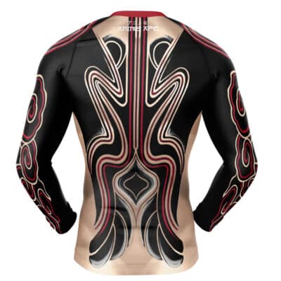 The Batman Beyond DC Comics Long Sleeve Rash Guard Compression Shirt features a bold, symmetrical tribal-inspired pattern in black, cream, and red on the back and sleeves, with "Animal Ape" printed at the upper back.