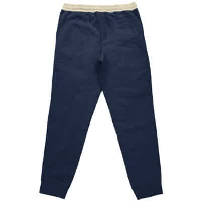 The Riyo Reaper Gachiakuta Streetwear Sweatpants (Copy) feature a navy blue design with a cream-colored elastic waistband, tapered legs, and ribbed cuffs, displayed flat from the back.