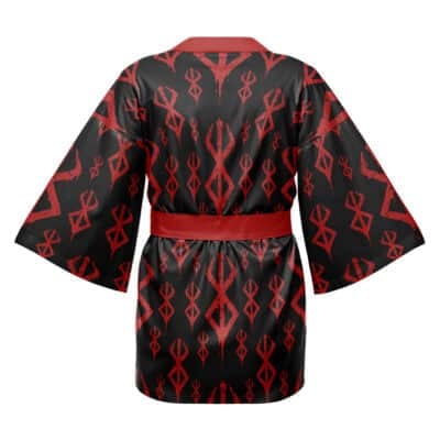 The Kaneda Good for Health Akira Happi Coat Haori Kimono (Copy) is a black kimono-style robe with wide sleeves, featuring a bold red geometric pattern and matching red belt, shown on a white background.
