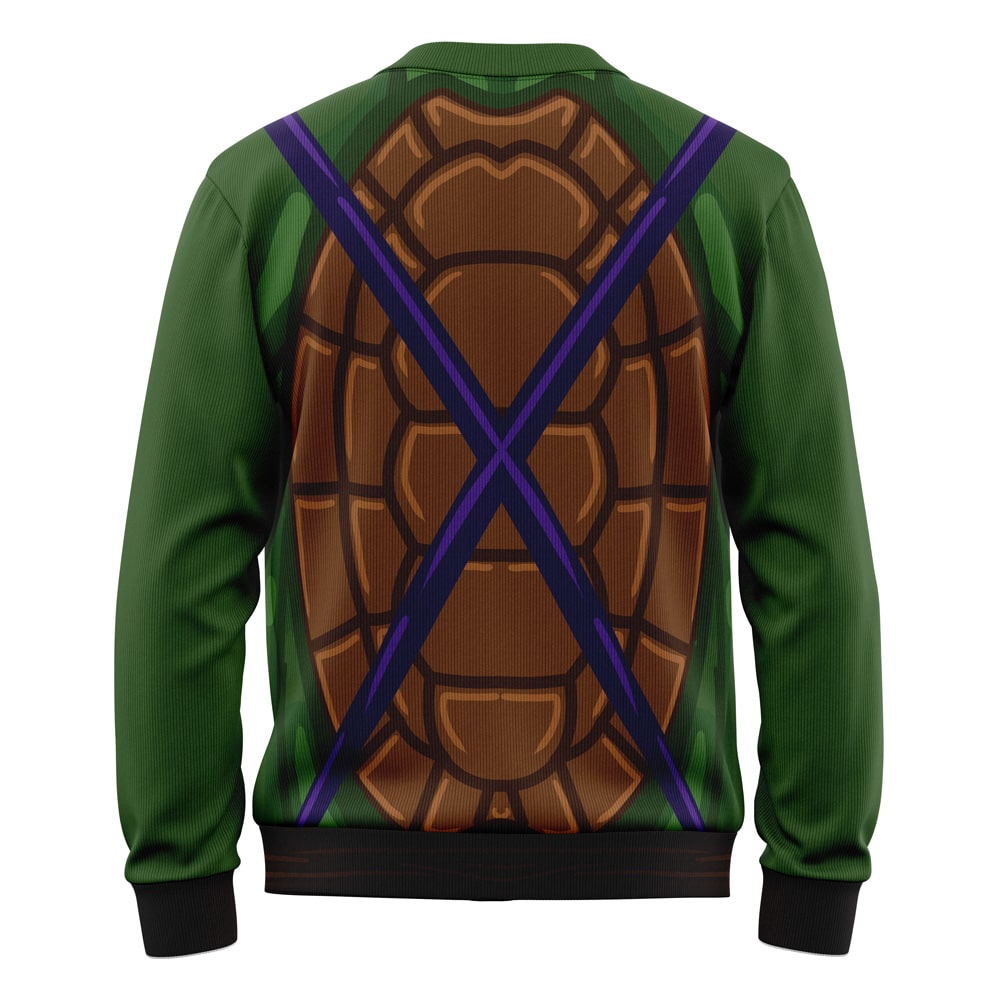 The Donatello Teenage Mutant Ninja Turtles Knitted Cardigan Sweater is green with a printed brown turtle shell and purple straps on the back, plus black cuffs and waistband—perfect for TMNT fans.