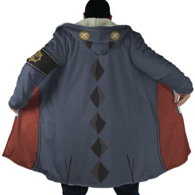 A person holds open the Jabber Wonger Cosplay Gachiakuta Dream Cloak Coat, a long, hooded gray coat with red lining, black diamond patterns on the back, a yellow emblem on one sleeve, and large buttons by the hood.