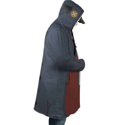 A person stands in profile with hands in pockets, wearing the Jabber Wonger Cosplay Gachiakuta Dream Cloak Coat— a long, hooded blue and brown coat featuring animal-inspired details like a yellow hood patch and black triangular shapes on the back.