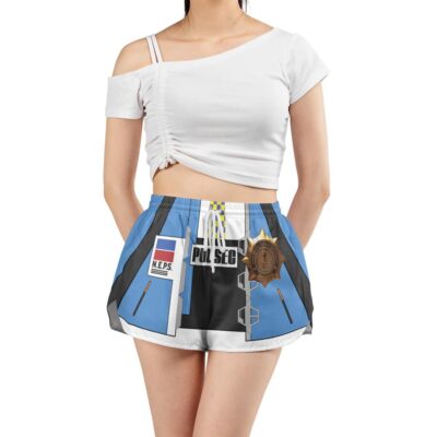 A woman wearing Princess Daisy Dukes Super Mario Bros Women’s Board Shorts, styled with blue shorts featuring police uniform print and a white off-shoulder crop top.