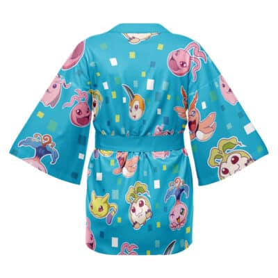 The Crest Symbols Digimon Happi Coat Haori Kimono (Copy) is a blue robe with wide sleeves, featuring a colorful pattern of cute cartoon-style creatures and geometric shapes, shown from the back.