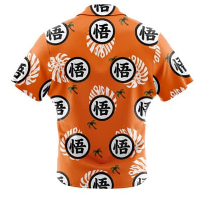 The Default Button Up Hawaiian Shirt (Copy) features a bright orange color with white and black circular kanji symbols, white tropical leaf patterns, and small green palm trees. The back side of the shirt is displayed.
