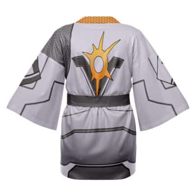 The Killjoy Valorant Happi Coat Haori Kimono is a gray, short-sleeved, knee-length robe featuring black and gold futuristic geometric patterns and a central sunburst emblem on the back, with a black waistband for accent.