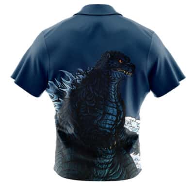 The Default Button Up Hawaiian Shirt (Copy) is a navy blue short-sleeve shirt with a bold Godzilla graphic on the back, showcasing blue and white accents and jagged dorsal fins.