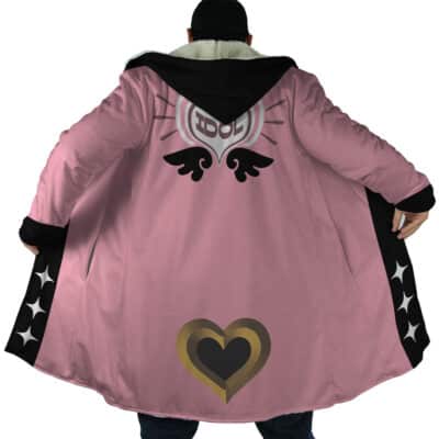 A person wearing the Belle Vibrant Store Manager Zenless Zone Zero Dream Cloak Coat (Copy), a long pink coat with black and gold heart designs, black star inner sleeves, and a fur-lined hood, is shown from the back with arms outstretched.