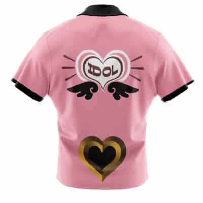 The Belle Vibrant Store Manager Zenless Zone Zero Button Up Hawaiian Shirt (Copy) is pink with black collar and sleeve trim, featuring a large winged heart with "IDOL" on the back, plus a smaller gold and black heart underneath.