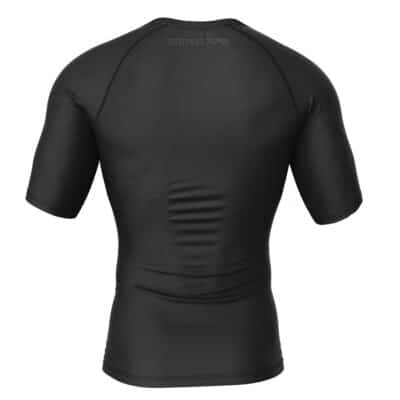 The Shinigami Death Seal Shippuden Short Sleeve Rash Guard Compression Shirt is shown from the back, featuring smooth, slightly shiny black fabric with subtle text near the upper neckline.