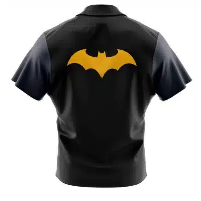A black short-sleeve Hawaiian shirt viewed from the back, featuring a large yellow Batman logo on the upper back. The shirt is named "Default Button Up Hawaiian Shirt (Copy)" and includes dark sleeves and a collar.