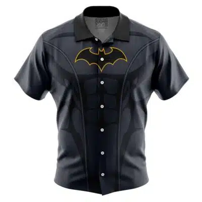 The Default Button Up Hawaiian Shirt (Copy) is a short-sleeve button-up featuring a black and gray Batman suit design with a yellow bat symbol on the chest, mimicking the look of Batman’s costume armor.