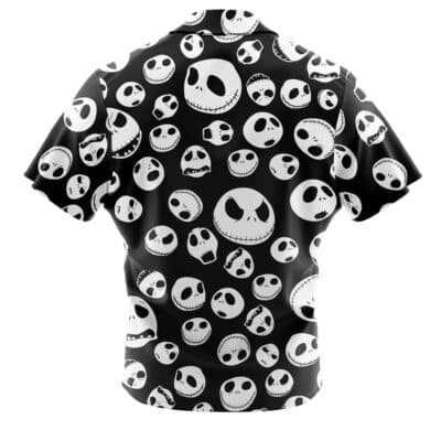 The Default Button Up Hawaiian Shirt (Copy) is a black short-sleeve shirt with a pattern of white cartoon skull faces in different expressions, inspired by Jack Skellington from The Nightmare Before Christmas.